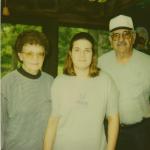 me and grandma and grandpa at going away party 2002