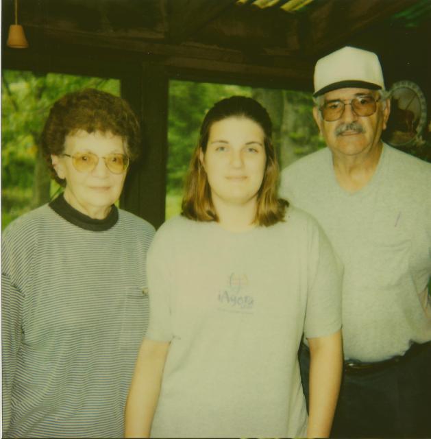 me and grandma and grandpa at going away party 2002