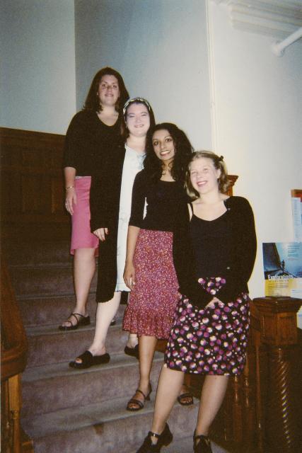 Roz, Erin, Radha and Nico getting ready for the Deans Host Dinner 2003