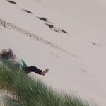 Portland - Sam rolling down the dunes
