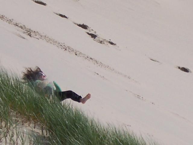 Portland - Sam rolling down the dunes