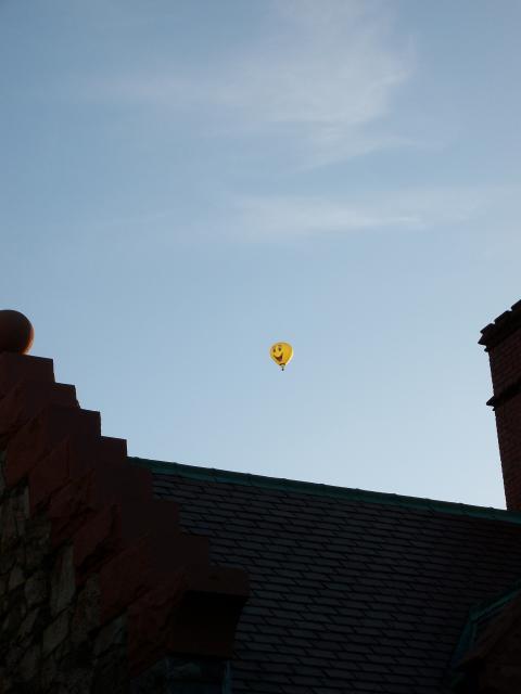 two giant yellow smiley face balloons just happened to float by after the ceremony...an auspicious sign, I think