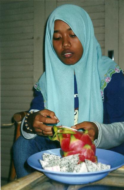 Julie trying dragonfruit